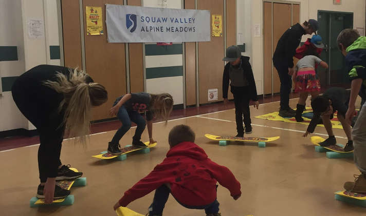 Burton teaching kids snowboarding off the slopes